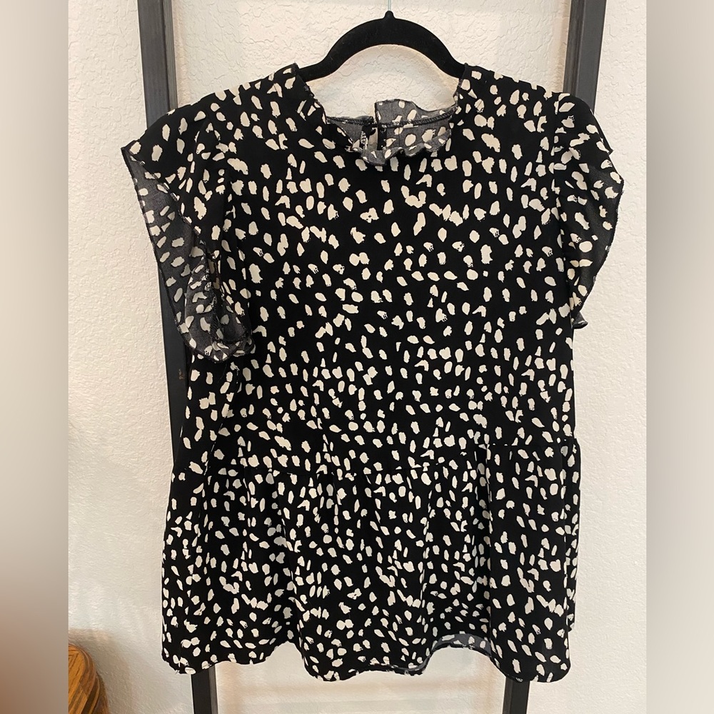 Black and white ruffle sleeved blouse